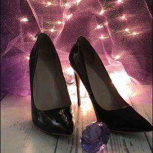 Black patent leather Elizabeth Tang ladies shoe.